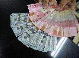 rupiah-menguat-tipis-ke-rp-16981-per-dolar-as_306044.jpg