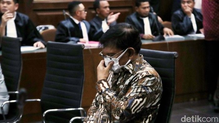 potret-johnny-g-plate-jalani-sidang-perdana-di-pn-jakpus-2_169.jpeg